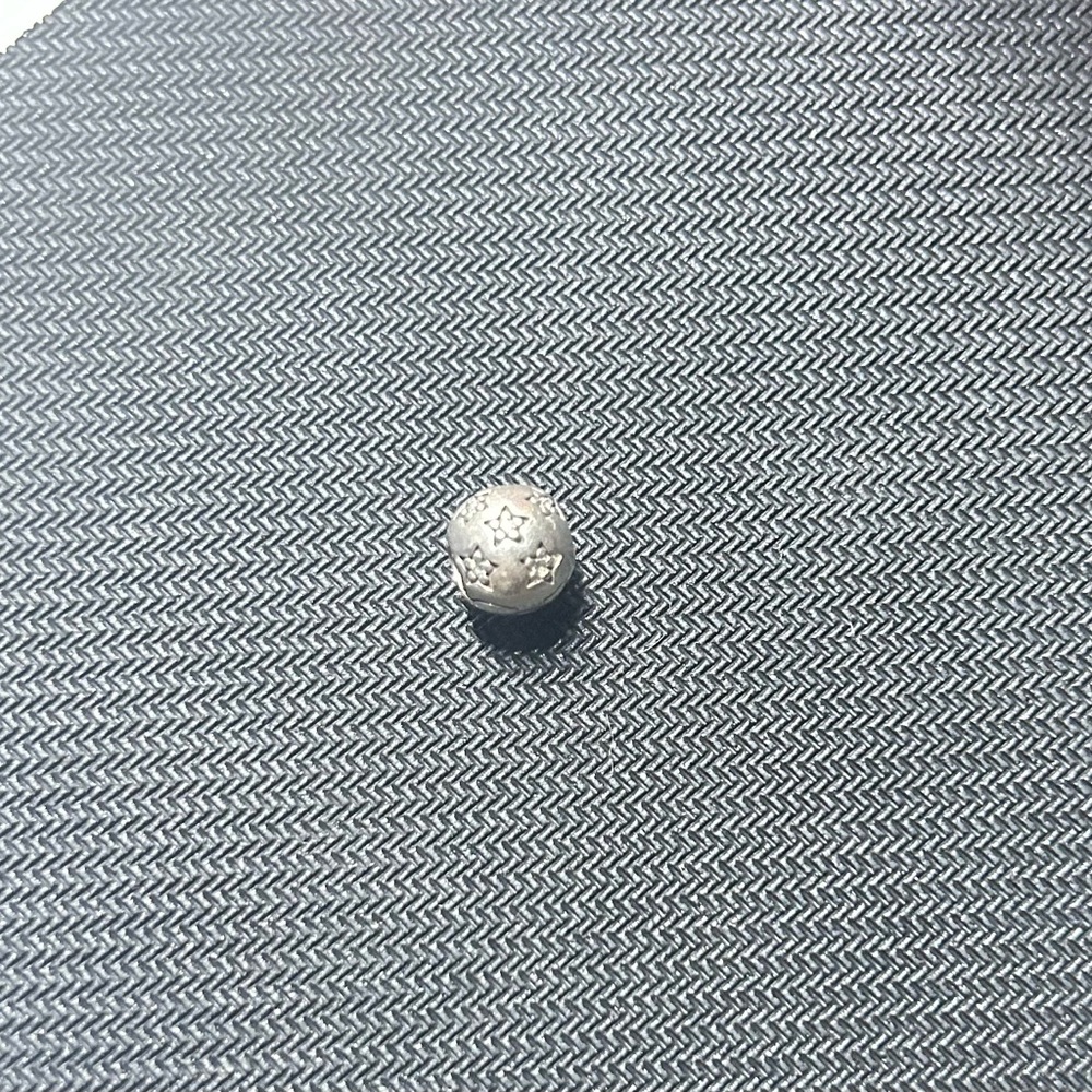 Authentic pandora twinkle star charm.